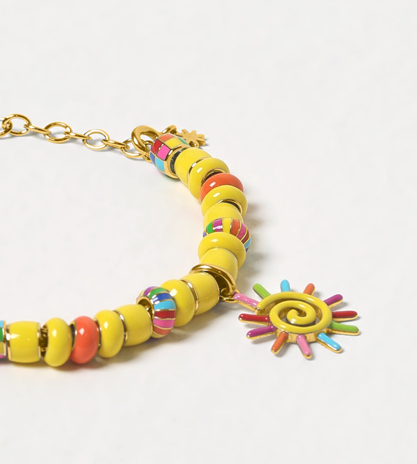 GOLD PAINTED SUN CHARM