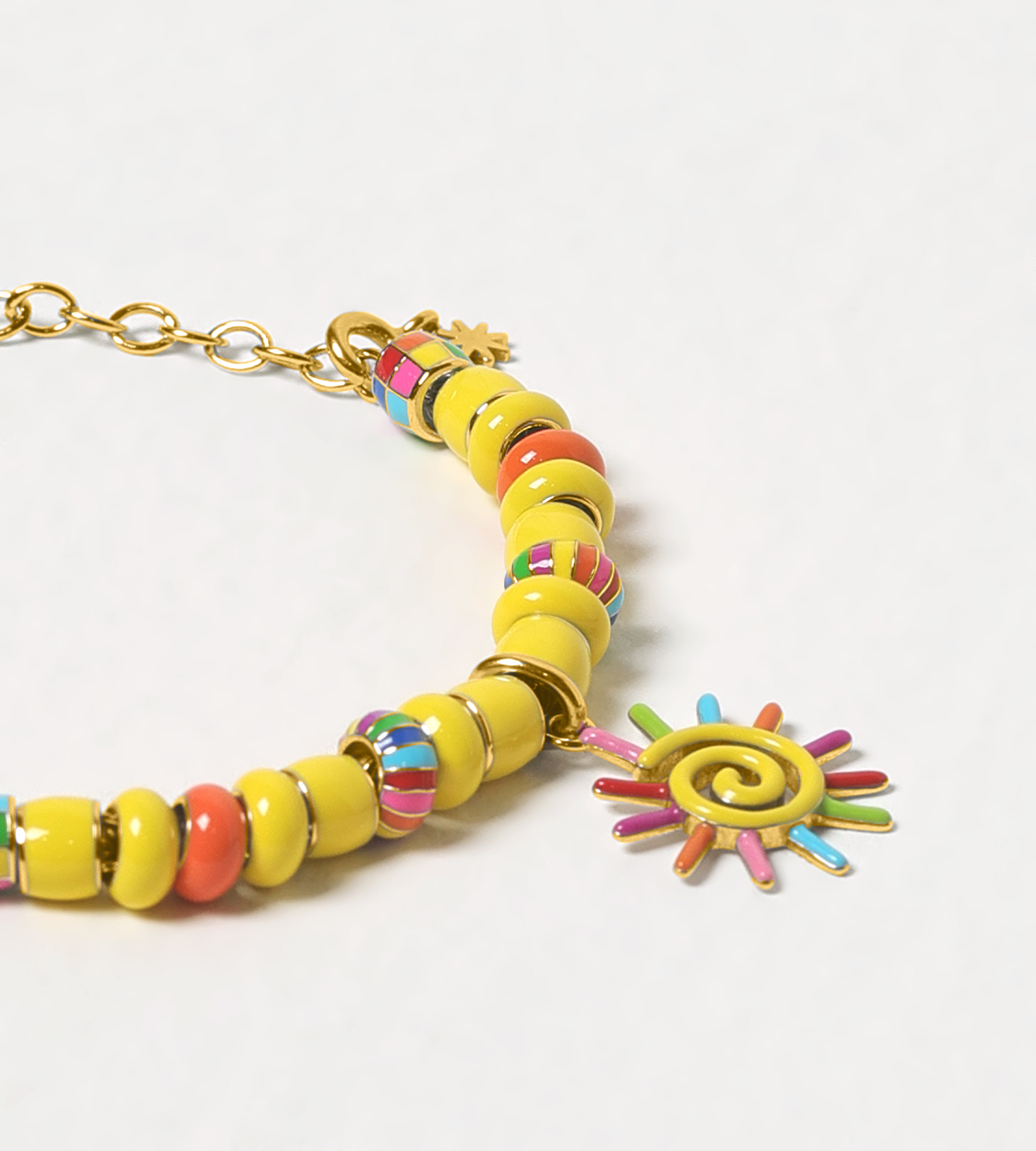 GOLD PAINTED SUN CHARM